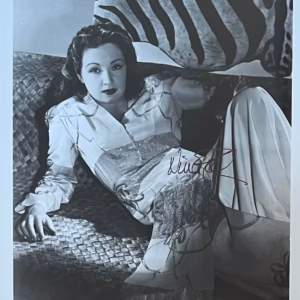 Nina Foch Autograph. Nina Foch hand-signed 10" x 8" black and white promo photo in excellent condition in black ink – authentic movie autograph with Certificate of Authenticity (COA)