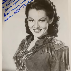 Adrian Booth Autograph: signed promo photo with COA & delivery from Presley Collectibles.
