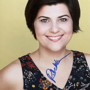 Rebekka Johnson Autograph Rebekka Johnson autograph on 10x8 color studio promo in floral dress, blue ink across chest, COA included