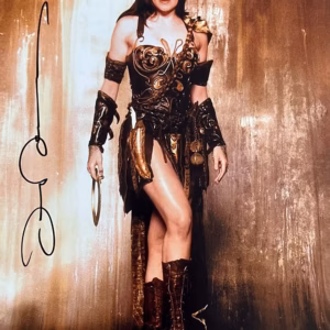 Lucy Lawless hand-signed 14" x 11" colour poster in excellent condition in black ink – authentic TV autograph with Certificate of Authenticity (COA)