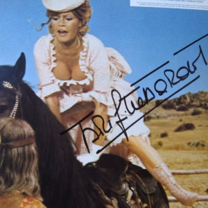 Brigitte Bardot The Legend of Frenchie King: 10x8 FGL horseback pink dress, product details, COA included, Buy Movie memorabilia from Presley Collectibles, tracked delivery.