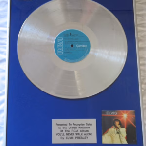Elvis Presley You'll Never Walk Alone. Elvis Presley You'll Never Walk Alone platinum record presentation in very good condition – authentic music award presentation with worldwide shipping and market leading 90-day money back guarantee.