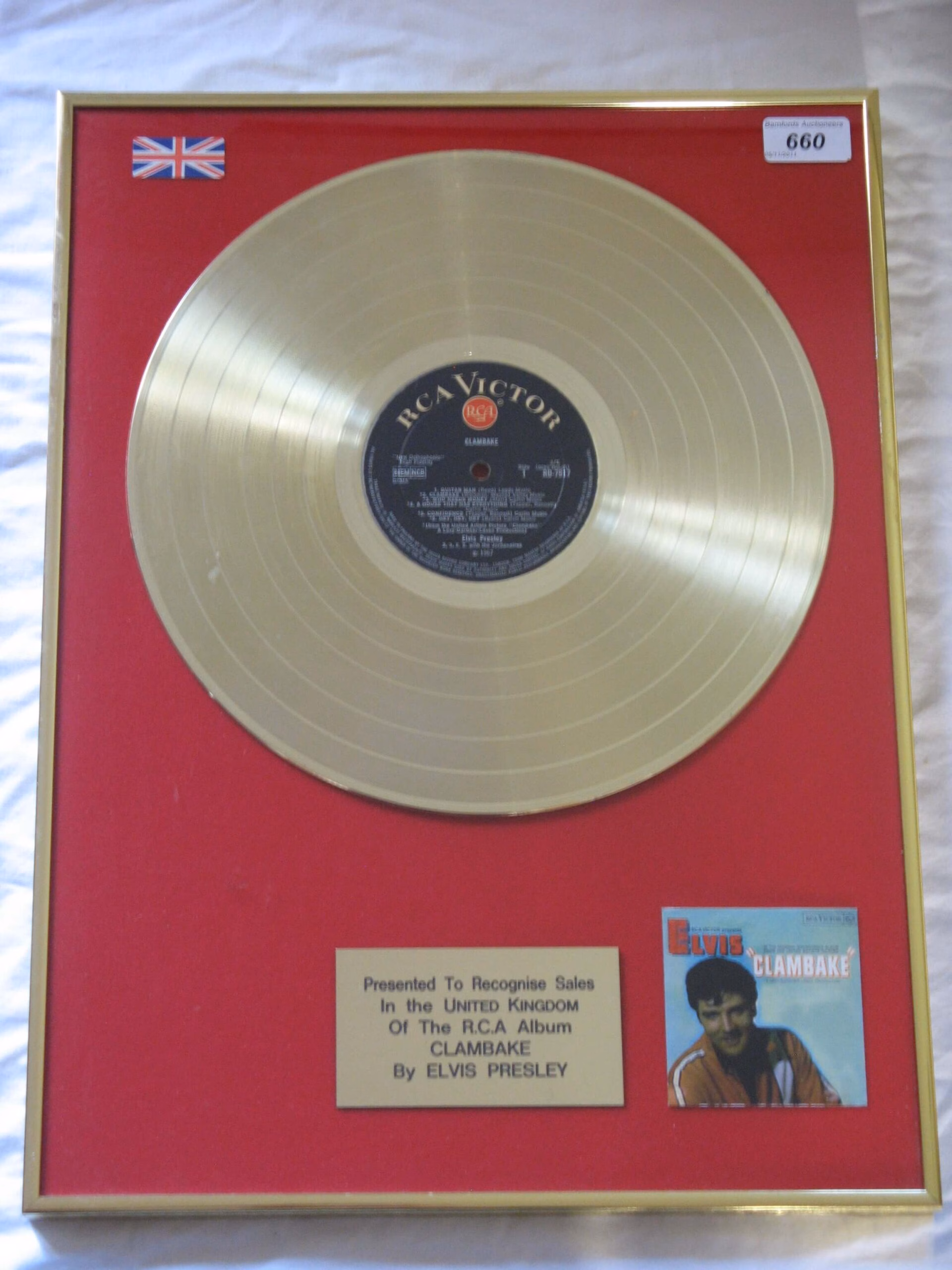 Elvis Presley Clambake. Elvis Presley Clambake gold record presentation in very good condition – authentic music award presentation with worldwide shipping and market leading 90-day money back guarantee.