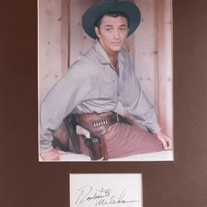 Robert Mitchum hand-signed 4″ x 3″ signed card in excellent condition in black ink on circa 1990s – authentic movie autograph with lifetime COA.
