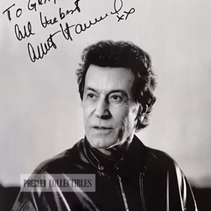 Signed black and white promo photo of Albert Hammond with inscription "All the best" in black ink.