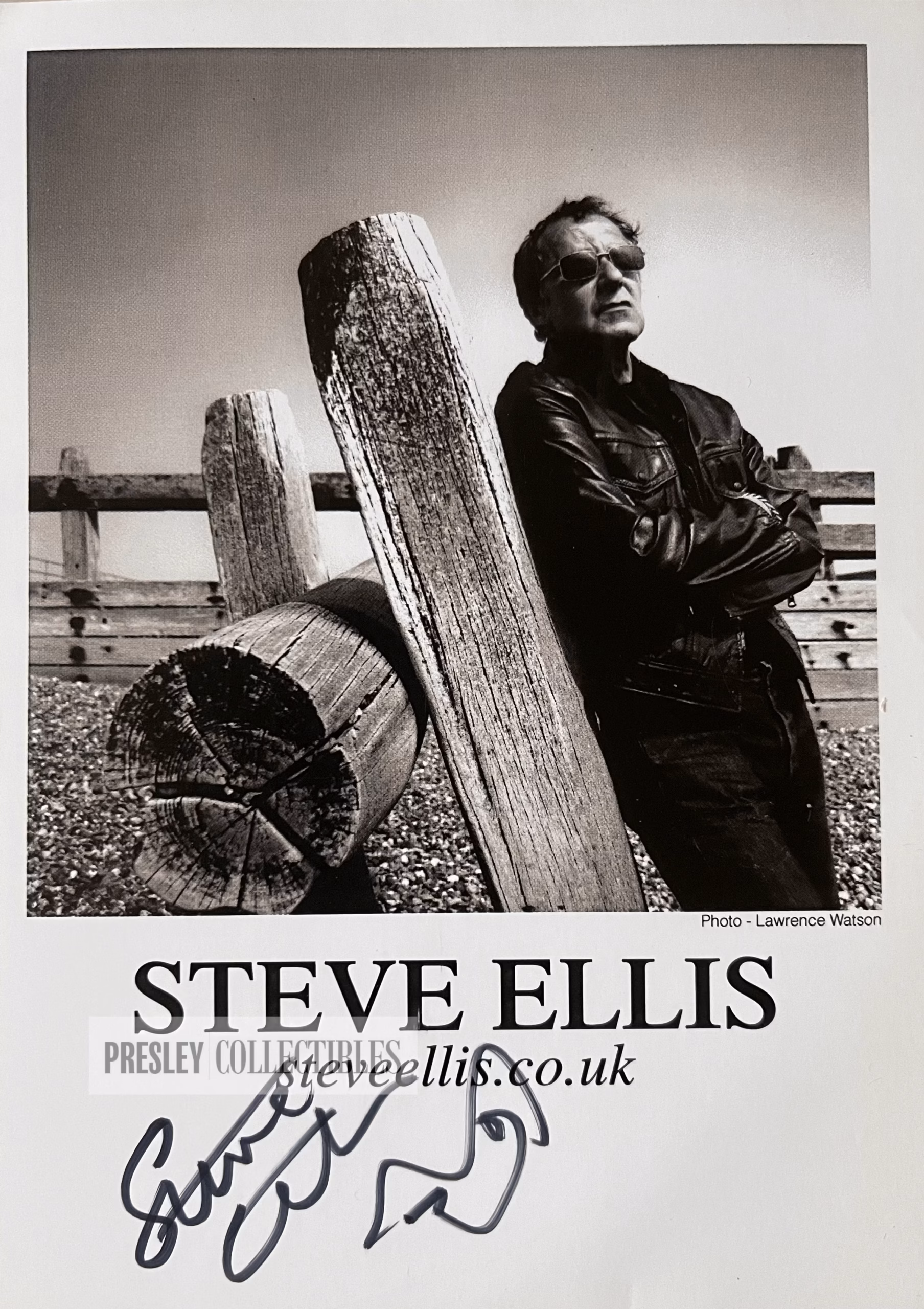 Signed black and white promo photo of Steve Ellis with bold black ink autograph on front.