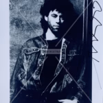 Bob Geldof Signed Photo 8x10 black‑and‑white denim jacket studio portrait with black ink autograph and COA from Presley Collectibles.