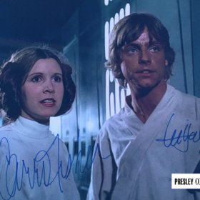 Princess Leia Luke Skywalker Cast Signed Photo - 8.25" x 12" Star Wars colour promo photo, hand signed by Carrie Fisher and Mark Hamill