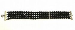 MARILYN MONROE: A Quad strand black diamond cut bead bracelet with silver metal accents, owned and worn by Marilyn Monroe. Size: 7.5 inches long.